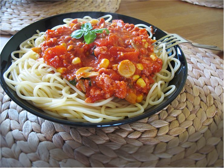 Spaghetti with Sauce at the Table